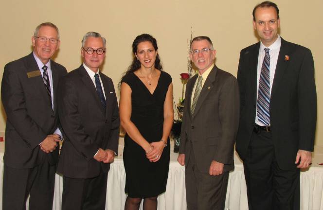 Warwick Valley Chamber of Commerce hosts its 74th annual membership dinner Vicky Garby of Zero Deals received the award for þÄúVolunteer of the Year.þÄù From left, Executive Director Michael Johndrow,Mayor Michael Newhard, Vicky Garby, Town of Warwick Supervisor Michael Sweeton and Chamber President Paul Rafanello.