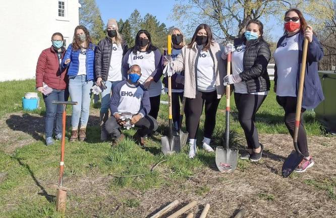 Ten volunteers from the Evolution Health Group of Pearl River planted trees along State School Road as part of the Town of Warwick’s Arbor Day celebration. The group planted red oaks, London Plane trees, hybrid elms and basswood along the entrance drive. Photo provided by Karen Emmerich.