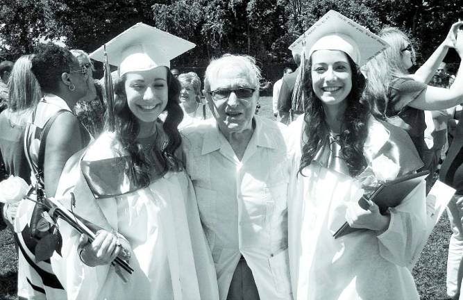 S.S. Seward Institute Class of 2012 Photo by Birgit Bogler Twins Alana and Carly Miller are pictured here with their grandfather, Tino Catauro.