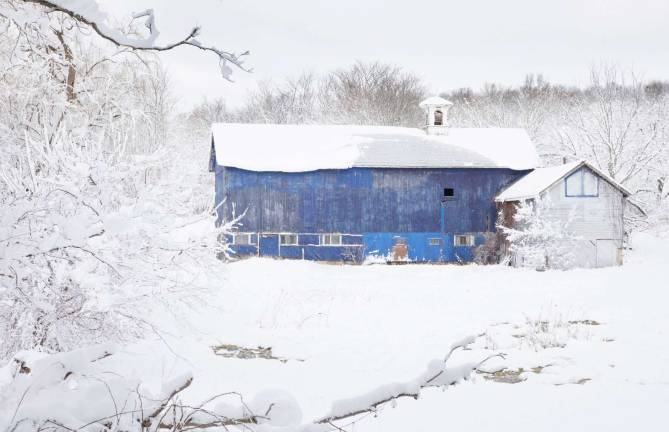 The color of snow Photo by Robert G. Breese A blue barn set in fresh fallen snow along Jessie Road in Warwick.