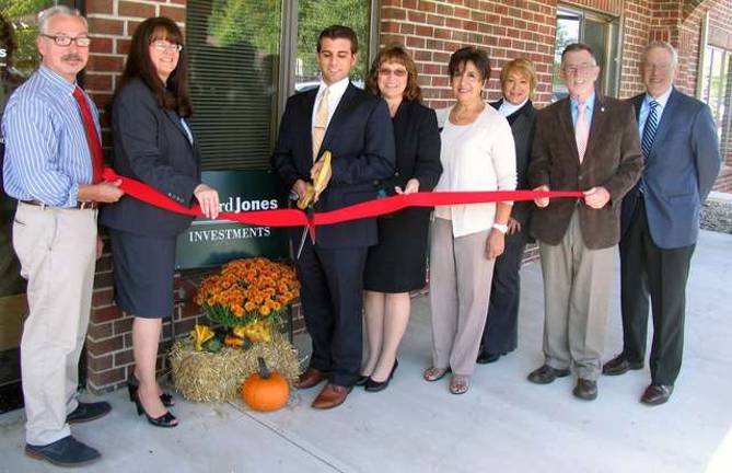 Edward Jones appoints Ryan O'Leary as financial advisor in Warwick office Photo by Roger Gavan Town of Warwick Supervisor Michael Sweeton, Mayor Michael Newhard and members of the Warwick Valley Chamber of Commerce joined Ryan OþÄôLeary and his staff to celebrate his appointment as financial advisor in the Edward Jones Warwick branch office at 77 Ronald Reagan Boulevard earlier this fall. From left, Mayor Michael Newhard, Branch Office Administrator Marianne Petersen, Financial Advisor Ryan OþÄôLeary, on call Branch Office Administrator Lisette Cuba, Sherry Bukovcan, president of the Warwick Valley Chamber of Commerce, WTBQ Station Manager Taylor Sterling, Town of Warwick Supervisor Michael Sweeton and Chamber Executive Director Michael Johndrow.