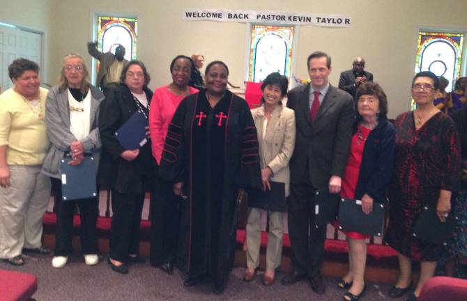 Union AME Church honors health care professionals On May 19, approximately 75 Warwick-area physicians, nurses, home health care attendants and other health care professionals were honored by Warwickís Union AME Church during the 11 a.m. worship service. Honorees pose with Rev. Dr. Rose Ellington Murray, pastor of Trinity AME Church in Harlem (center).