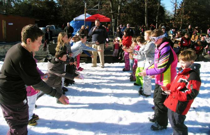 Carnival raises $5,000 for Avon 2012 Breast Cancer Walk Photo by Roger Gavan Enjoying spring-like weather, families enjoyed skiing, snow boarding - and even tossing water balloons - along with food and refreshments during the third annual Winter Carnival held Sunday at Mount Peter Ski Area. The event raised almost $5,000 and still counting for Team Mount Peter, which will participate in the 2012 Avon Breast Cancer Walk. Mt. Peter is still selling the ìMen of the Mountainî calendar for $10 with all proceeds going to the 2012 Avon Breast Cancer Walk. To purchase a calendar or make a donation call 986 4940, stop by or visit www.mtpeter.com.