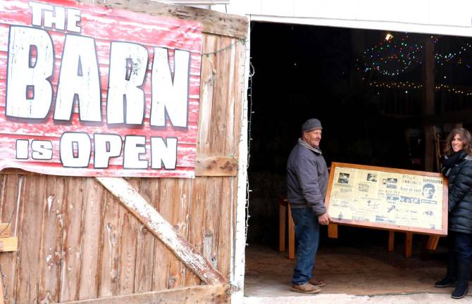Rocco Manno Barn on Warwick offers many unique and local holiday gifts Photo by Roger Gavan Rocco Manno's sister Kim Corkum and their father, Rocco Manno Sr., display one of the unique pieces of furniture offered at the Barn.