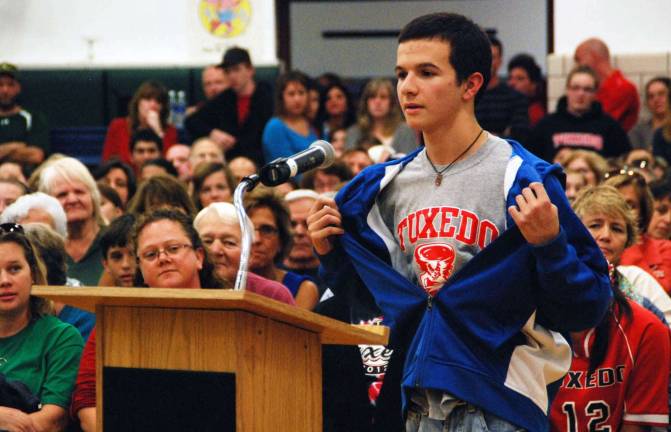 The ‘walk for choice’ Photo by Ed Bailey Dean Stanton, 15, voices his opinion and shows his shirt and jacket from Tuxedo High School at Wednesday's Greenwood Lake School Board meeting.