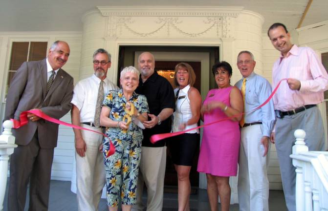Warwick House of Antiques celebrates opening of new location On Tuesday, July 16, local officials and members of the Warwick Valley Chamber of Commerce joined Anthony Alfero and his wife, Ruth Fritsch, the owners of the Warwick House of Antiques, for the grand re-opening of their new location at 12 Oakland Ave. From left, Deputy Town of Warwick Supervisor James Gerstner, Mayor Michael Newhard, owners Ruth Fritsch and Anthony Alvero, Warwick Valley Chamber of Commerce Vice Presidents Mechelle Casciotta and Sherry Bukovcan, Executive Director Michael Johndrow and President Paul Rafanello.