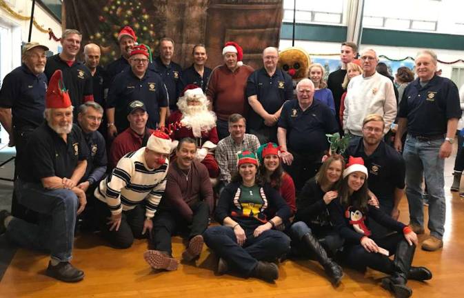 Many thanks need to be offered Provided photo The Warwick Valley Knights of Columbus Council #4952 held its sixth annual Breakfast with Santa at the St. Stephen-St. Edward School Gym on Saturday, Dec. 16; 125 children and their families enjoyed a breakfast of waffles, sausage and potatoes, all generously donated by the ShopRite of Warwick.