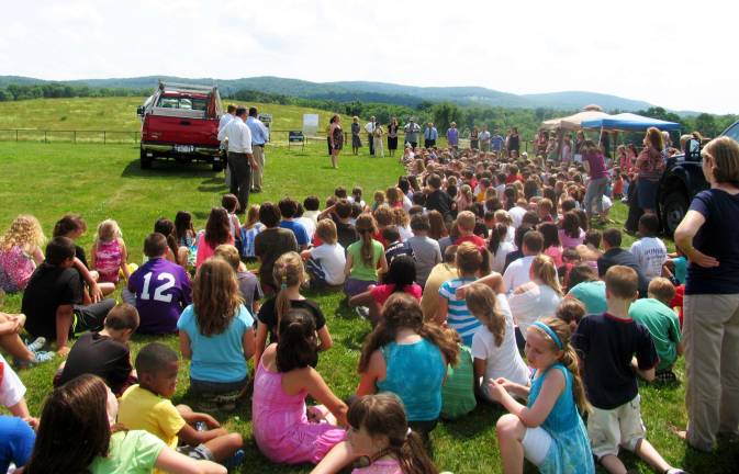 The sky is the limit Photo by Roger Gavan Caroline Moore addressed school administrators, educators, local business representatives, Sanfordville students and others who attended a groundbreaking ceremony for her Senior Project, an astronomy observatory.