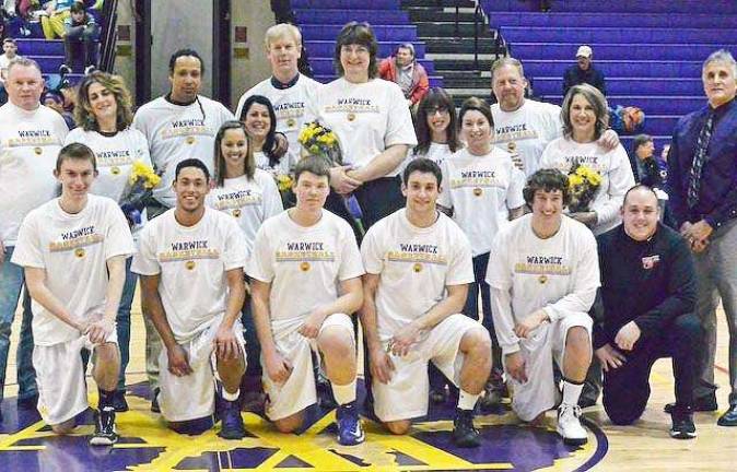 They got game Photo provided by Greg Sirico Warwick Valley High Schoolís Athletic Department recognized the seniors on the varsity basketball team on Tuesday, Feb. 19. Pictured in the front row, backed by their families, from left to right, are: seniors Ryan Guilfoyle, Anthony Mann, Daniel Filipowski, Jordan Tortaro and Eric Fahnestock with Junior Varsity Basketball Coach Aaron Hasbrouck and Varsity Coach Tom Folino.