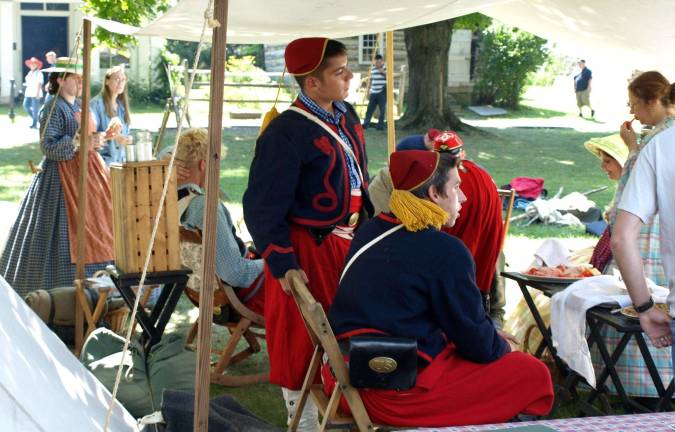 War games Photo courtesy of John Doyle The gaily dressed re-enactors represent the 5th New York Volunteer Infantry, more commonly known as "Duryee's Zouaves."