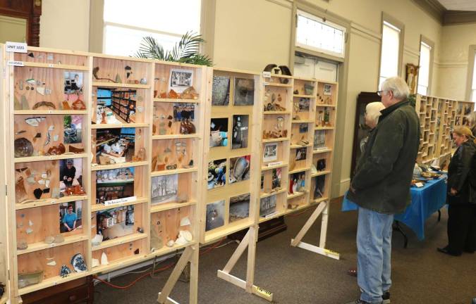 Historical society presented 'Fragments from the Past' event at Buckbee Center The event featured elaborate displays of items collected, including wall units dividing the finds by the layers of excavation.