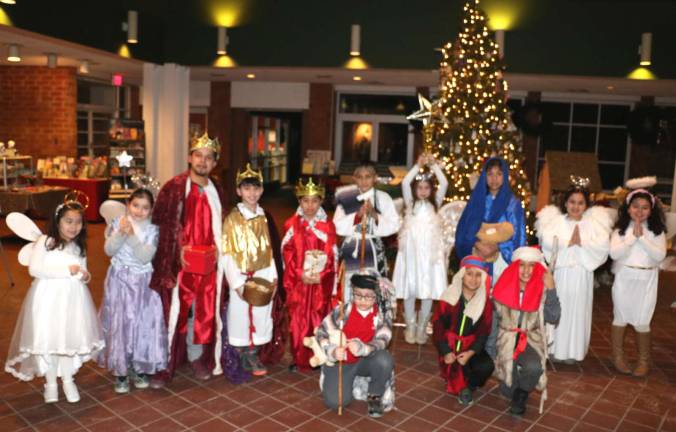 Spanish Mass at St. Stephen's held to celebrate El Dia De Reyes, the Epiphany After the service the children posed for photographs.