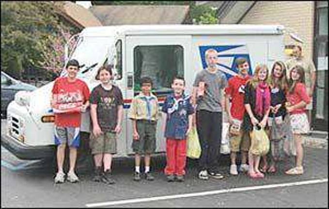Successful postal service community food drive Successful postal service community food drive