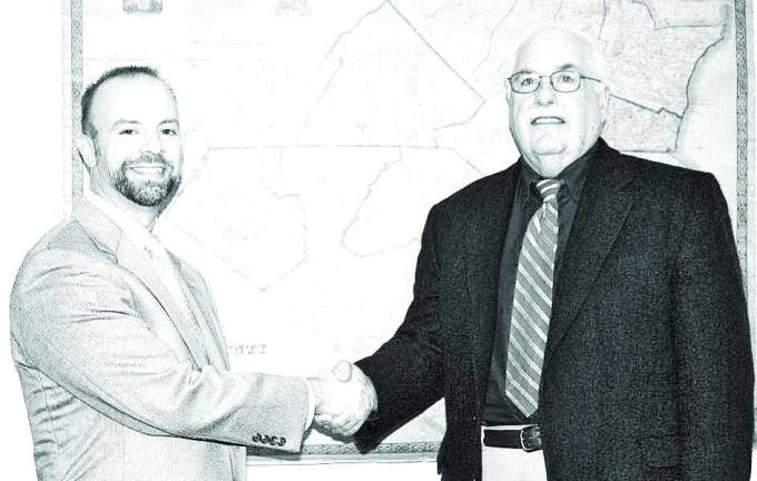 Hill-N-Dale acquires Hardenburgh Abstract Company John M. Wood, left, president of Hill-n-Dale Abstracters Inc., welcomes Hardenburgh Title Agency’s James V. Rinaldi. Hill-N-Dale acquired Hardenburgh from Provident Bank effective Jan. 1, 2013 making Hill-N-Dale the largest title company in the Mid Hudson Valley region. The companies will operate as separate entities at their present locations.