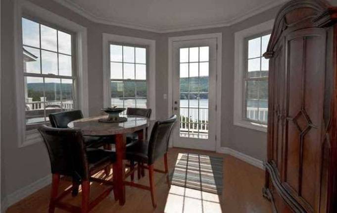 The views from the lake This pristine home has four bedrooms, six acres of property and lake views from every window The views from the lake This pristine home has four bedrooms, six acres of property and lake views from every window