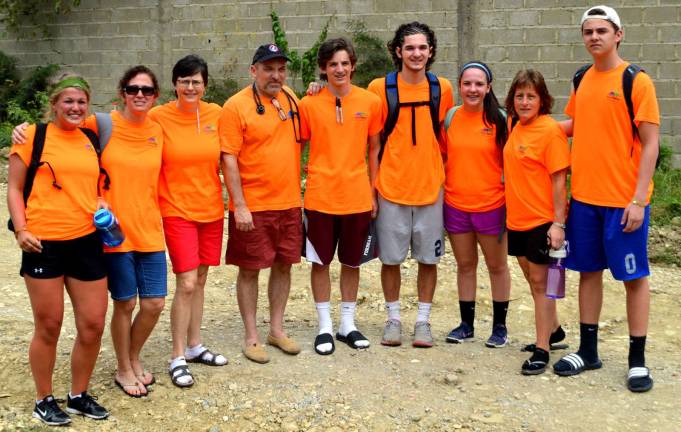 Bringing help and hope Photos provided by Mary Juliano St. Stephen's team from left, Rachelle Garneau, Janette Garneau, Mary Juliano, Dr. John Juliano, James Juliano, Andrew Juliano, Erin Kerr, Janet Grahn and Tommy Garneau.