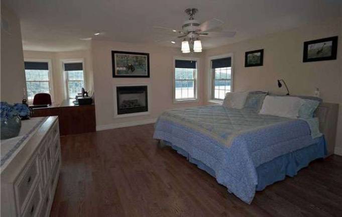 The views from the lake This pristine home has four bedrooms, six acres of property and lake views from every window The views from the lake This pristine home has four bedrooms, six acres of property and lake views from every window