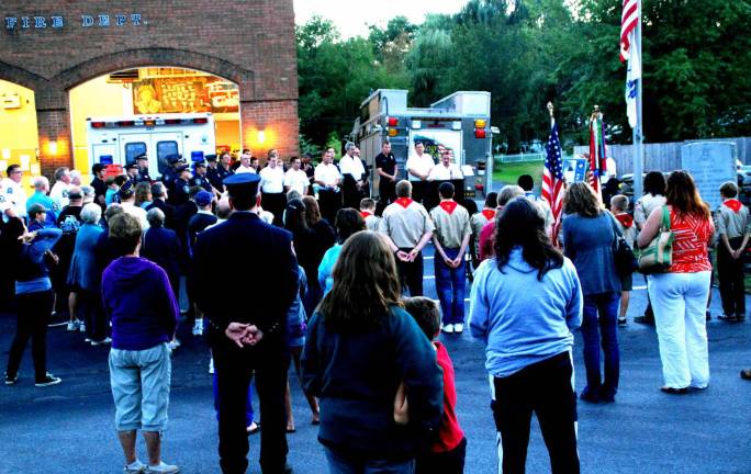 Warwick's eleventh 9-11 anniversary ceremony held in Veterans Memorial Park Photo by Ed Bailey Greenwood Laker Fire Chief John Rader addresses the people who gathered outside the firehouse Tuesday evening for the Sept. 11 memorial in the Village of Greenwood Lake. The service was sponsored by the fire department and the Amblunce Corps.