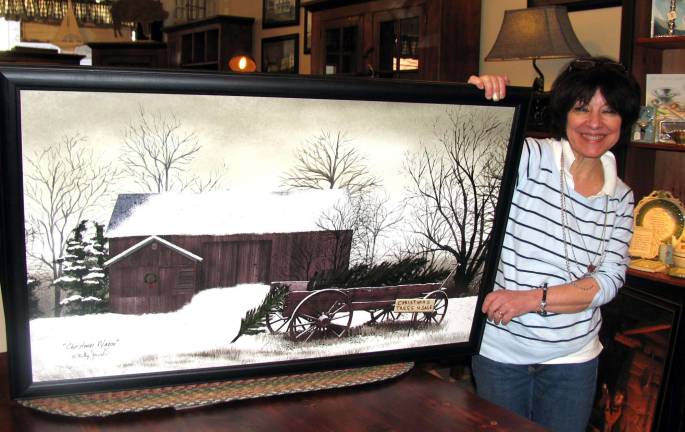 Small Business Saturday Nov. 30 offers incentives for shopping in Warwick and elsewhere locally Photo by Roger Gavan Mary Beth Schlichting, owner of Frazzleberries Gift Shop, with a landscape painted by artist Billy Jacobs, who will be at the store on Small Business Saturday with his in-store Folk Art Trunk Show.