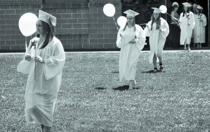 S.S. Seward Institute Class of 2012 Photo by Birgit Bogler Students make their way to graduation ceremony last Saturday at S.S. Seward Institute in Florida. It was the school's 115th graduation.