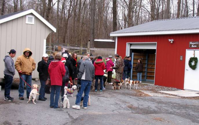 Photos by Roger Gaven Enjoying good weather for the weekend, crowds lined up at the Warwick Valley Humane Society's Animal Shelter for the annual Pet Photos with Santa event.