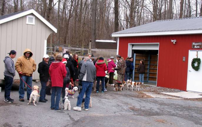 Santa loves the four-legged family members too Photos by Roger Gaven Enjoying good weather for the weekend, crowds lined up at the Warwick Valley Humane Society's Animal Shelter for the annual Pet Photos with Santa event.