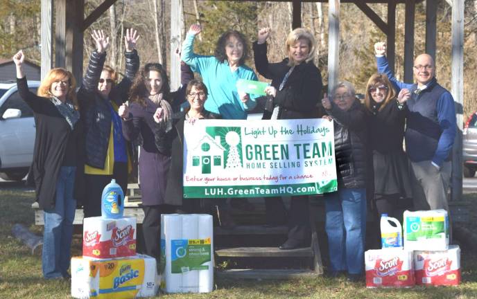 Green Team Home Selling System announces winners of 'Light up the Holidays' Provided photo Broker/principal Geoff Green (far right) and staff and agents of the Green Team Home Selling System join in celebrating with contest coordinator Jennifer DiCostanzo (top right), as she presents a check for $2,300 to Suzyn Barron (top left), president of the Warwick Valley Humane Society.