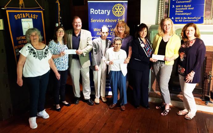 Warwick. Rotarians donate $6,000 to food pantries Warwick. Rotarians donate $6,000 to food pantries