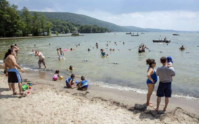 The beach is open File photo by Robert G. Breese The unofficial start to summer happens this Memorial Day weekend with the opening of the beach at the Thomas P. Morahan Waterfront Park on Greenwood Lake.
