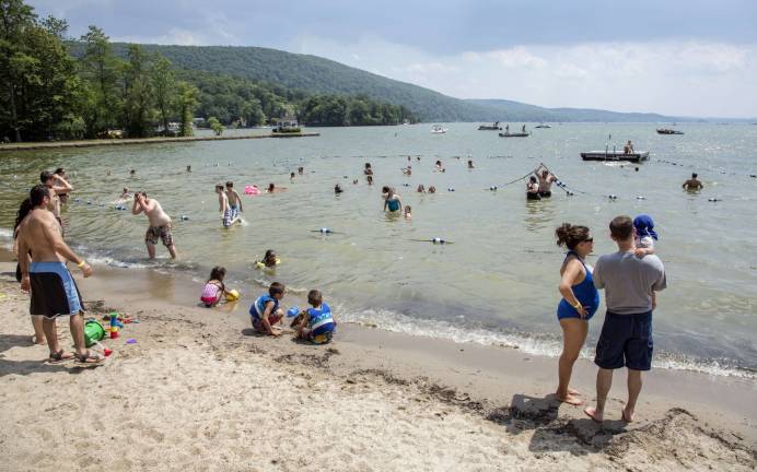 Warwick town beach opens Photo by Robert G. Breese Swimmers cool off at the Thomas Morahan Waterfront Park in Greenwood Lake one hot steamy day last July.