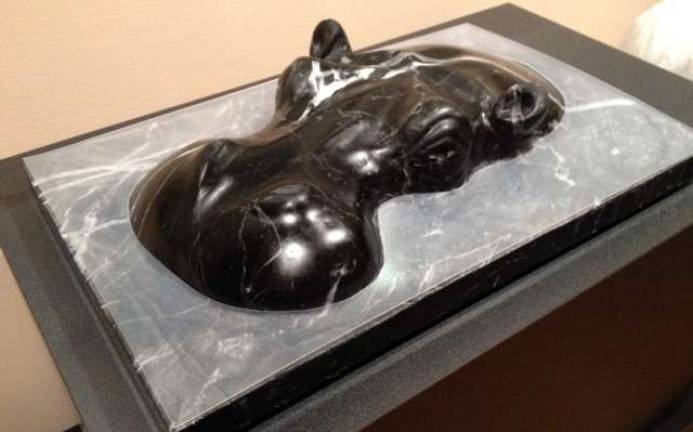 SUNY Orange hosts sculpture show "Hippopotamus," black marble by Philip Monteleoni.