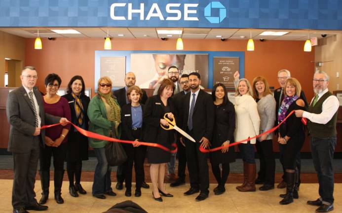 Chase celebrates fifth anniversary of its Warwick branch office Provided photo Town of Warwick Supervisor Michael Sweeton (far left), Mayor Michael Newhard (far right) and members of the Warwick Valley Chamber of Commerce joined Chase branch manager Jessica Hritz (center) and her staff for a ribbon cutting ceremony celebrating the fifth anniversary at the branch located at 146 Route 94S.