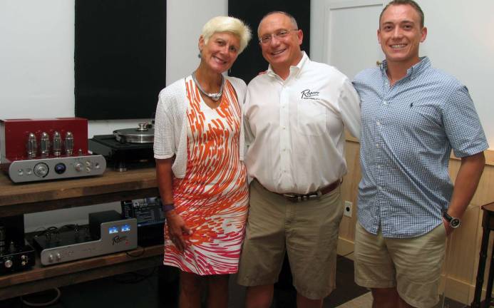 Rogers High Fidelity celebrates new factory location in Warwick Photo by Roger Gavan Roger Gibboni (center) with his wife Linda Dulye and son Roger.