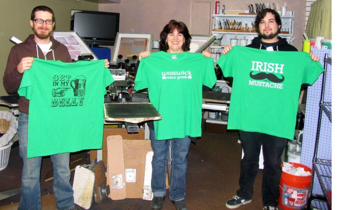Big changes at The Toy Chest just in time for St. Patrick’s Day Photo by Roger Gavan Sue Loughren, owner of the Toy Chest at 62 Main St. in Warwick, and her partners in the storeís T-shirt screen printing business, Jeff Padham (left) and Joe Hallmark, have created 10 different styles of T-shirts for this St. Patrickís Day, March 17.