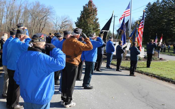 VFW Post 4662 Commander Dan Burger opened the official ceremony with the Pledge of Allegiance.