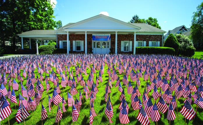 Departed veterans honored Flags in memory of each of Warwick’s community veterans on view in front of Lazear Smith & Vander Platt Memorial Home.