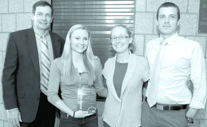 Scholar-athlete from Warwick earns prestigious SUNY leadership award Pictured are SUNY Canton Athletic Director Randy B. Sieminski, Ron LaValle Leadership Award winner and management major Megan M. Mydosh, Women's Cross Country Coach Kathryn Kennedy and Men's Cross Country Coach John M. Kennedy shortly after Mydosh received her award at SUNY Canton's faculty assembly.