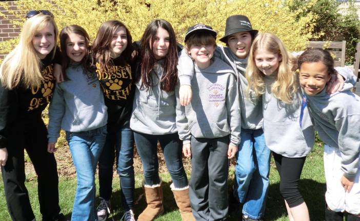 Two Warwick Odyssey of the Mind teams move on to world competition Members of the Warwick United Methodist Church team (formerly Sandfordville Elementary) are, from left to right: Coach Taylyn Carter, Grace Yurchuk, Gabriele Goodman, Madeleine Todd, Colm Davidson, Matthew Kaytes, Katherine Pfingst and Paina Gamory.