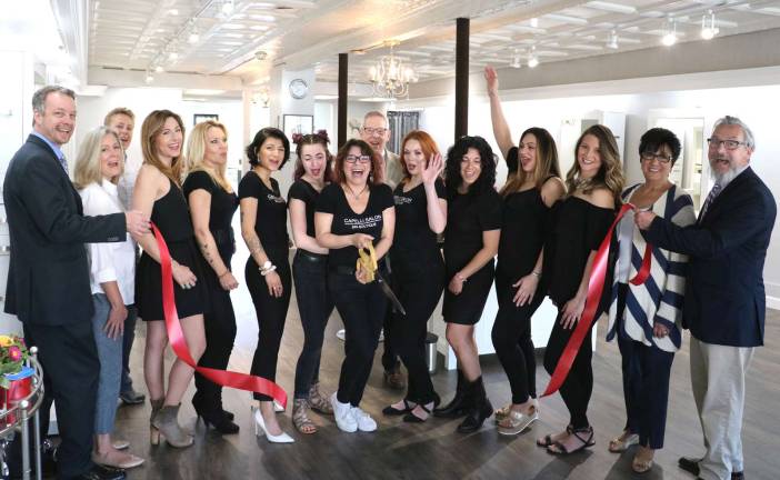 Capelli Salon and Spa Boutique celebrates grand opening of new location Photo by Roger Gavan On Wednesday, May 17, Mayor Michael Newhard (far right) and members of the Warwick Valley Chamber of Commerce joined owner/operator Laura Gallo-Mignone (center), members of her team, friends and associates for a ribbon-cutting ceremony to celebrate the recent opening of Capelli Salon and Spa Boutique in its new location at 46 Main St.