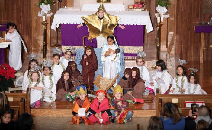 Twice blessed Photos courtesy of David Malantic The first Christmas Pageant at Holy Rosary Church in Greenwood Lake took place on Monday, Dec. 19: Pictured above are Ella McCormack as the main star, Luis Barajas Morales as Joseph, Liliana Surun as Mary, Alexis Haindl as the main angel, Alexa Pitiger, Ileana DelValle, Hailey Fumo, Leila Thurber, Valentina Del Canto, Erin Persico, Grace Velez, Karen Polanco and Quinn Westphal as angels, Jake Mulcahy, Samir Sidne and Evan Jennings as shepherds along with Carmine Scotto as innkeeper/shepherd, Nicholas Fox, Ian Ludmerer and Kellan Brennan as wisemen.