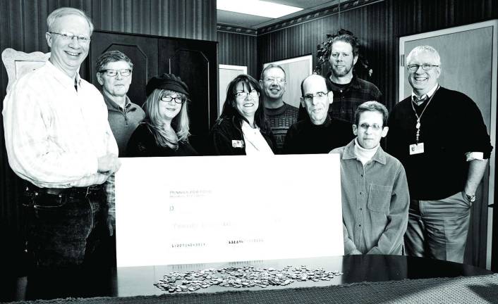 'Pennies for Food' effort raises $20,00 Celebrating the successful "Pennies for Food" fund raiser to support the Warwick Ecumenical Food Pantry are, from left to right: Charles W. Hemstreet, manager of the Warwick Ecumenical Food Pantry; David Eaton, Warwick Valley School Board president; Tracey Pietrzak, PTA Council president; Katina Dombrowski, Warwick ShopRite HR coordinator; Neil Sinclair, Warwick Rotary Club president; Glenn P. Dickes, community supporter; Ken Mitchell, Track 7 Postal Center; Susan D. Dickes, community supporter; and Dr. Raymond Bryant, Warwick Valley school superintendent.