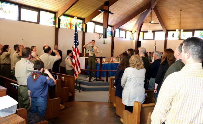 Two Troop 45 Boy Scouts advance to highest rank at Eagle Court of Honor Chandler Kent led the Pledge of Allegiance.