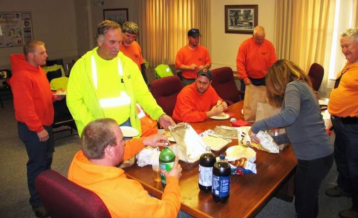 In Sandy’s wake Photo by Roger Gavan. Additional photos can be found online at warwickadvertiser.com Village of Warwick DPW workers break for lunch after 17 hours of work and more to go.