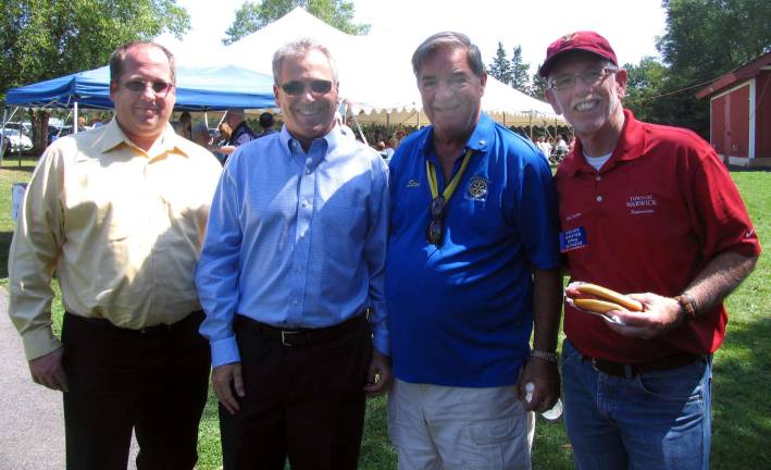 Thanks to Jeff Rosenberg of Big V Properties, tickets for the 2015 Senior BBQ were available free of charge to any senior citizen in the Town of Warwick. From left, Big V Controller Brent Hendrix, CEO Jeff Rosenberg, Rotary District Community Chair Stan Martin and Town of Warwick Supervisor Michael Sweeton.