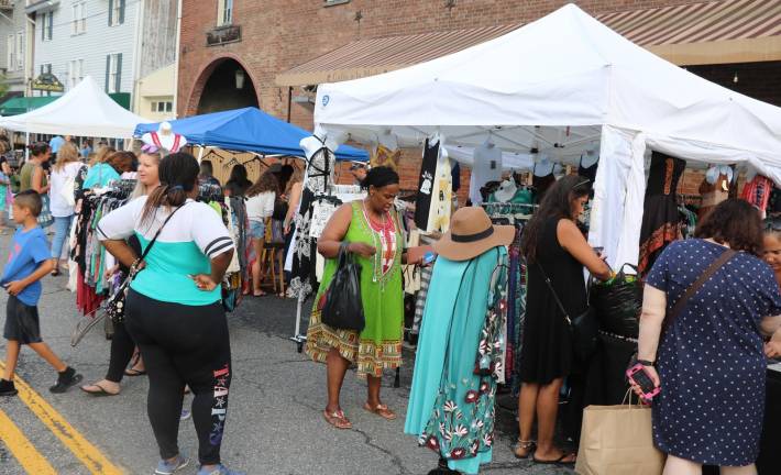 When the skies cleared the ladies and more than a few men came out to enjoy the twenty-second annual celebration of Ladies Night Out and Queen for a Day.