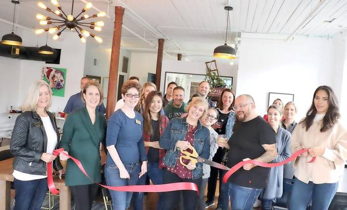 On Friday, Oct. 11, members of the Warwick Valley Chamber of Commerce joined the Dreamworx owners, John Donahue and Megan Cook (center), their staff, clients and friends to celebrate the firm’s reopening under new management with a ribbon-cutting ceremony.