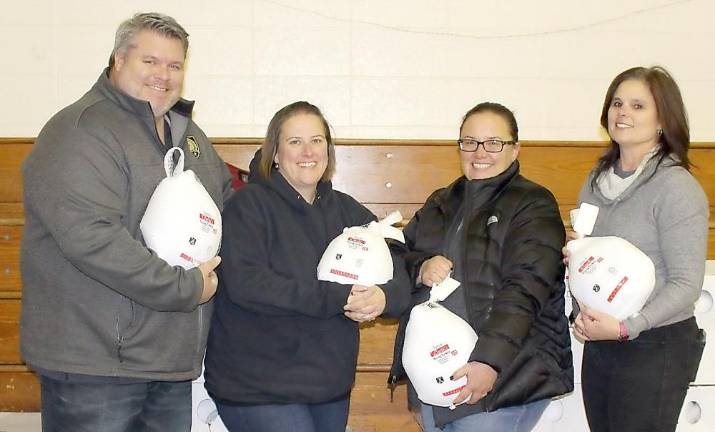 Catholic Charities received a generous donation of 80 turkeys from the Orange County Tavern &amp; Restaurant Association that were distributed to families in need. The turkeys, delivered by association president Tommy O’Toole, his wife Christine O’Toole and association secretary Jen Gillett, were accepted by Kristin Jensen, Chief Advancement Officer, Catholic Charities of Orange, Sullivan and Ulster.