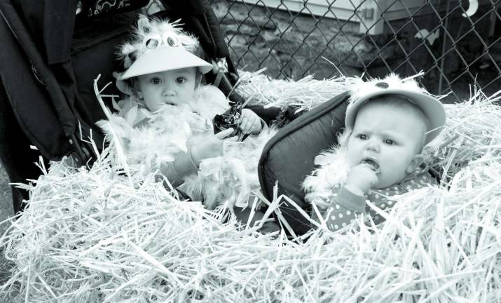 Greenwood Lake gets an early start for Halloween Photos by Ed Bailey Two baby chickens in a straw wagon were in the parade: From left to right: Skylar Clifford and Evelyn Boula,