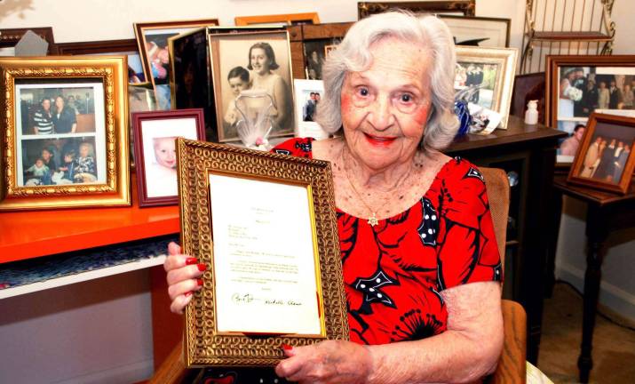 Many happy returns, Gertrude Photo by Ed Bailey Gertrude Zane of Warwick holds a letter she received from President Obama. She had written the president, telling him to bring the troops home. He wished her a happy 102nd birthday.