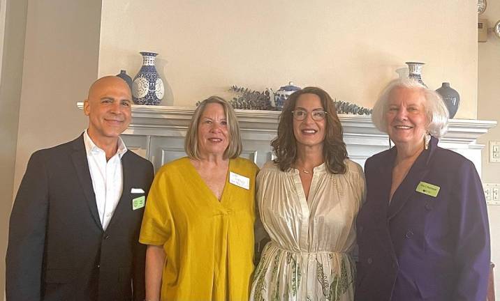 L-R: Hilton Dionet, Lisa Atkins, Robin Sobiech, and Pat Conroy Reinhardt. Not pictured: Laurie Unick and Patti Leo.